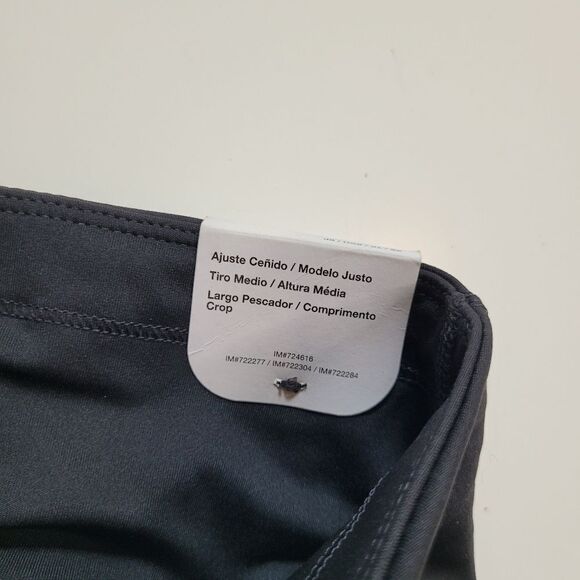 NEW NIKE FAST DRI-FIT BLACK MID RISE CROPPED LEGGINGS TIGHTS ZIP POCKETS XS NWT - Picture 4 of 10